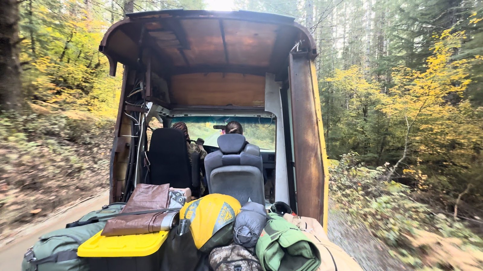 Buck driving a wooded trail at Browns Camp