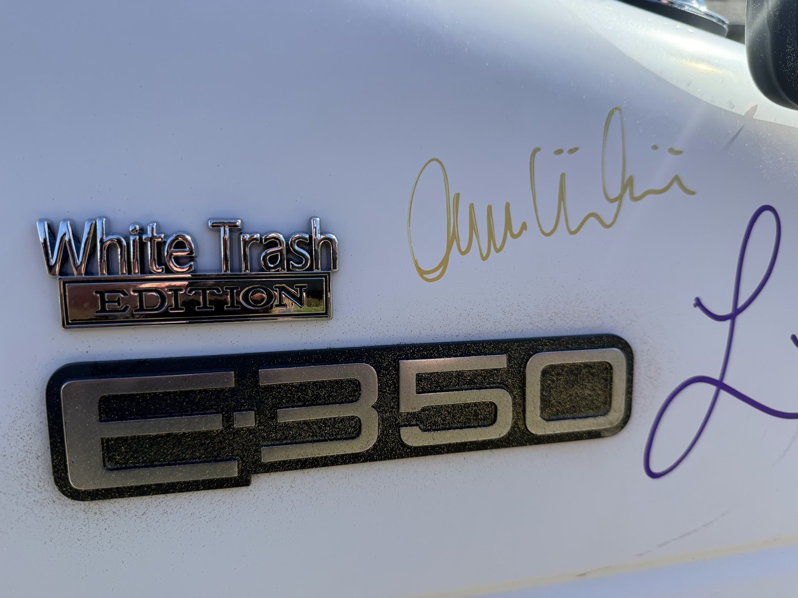 A White Trash Edition badge beside Buck’s E350 emblem