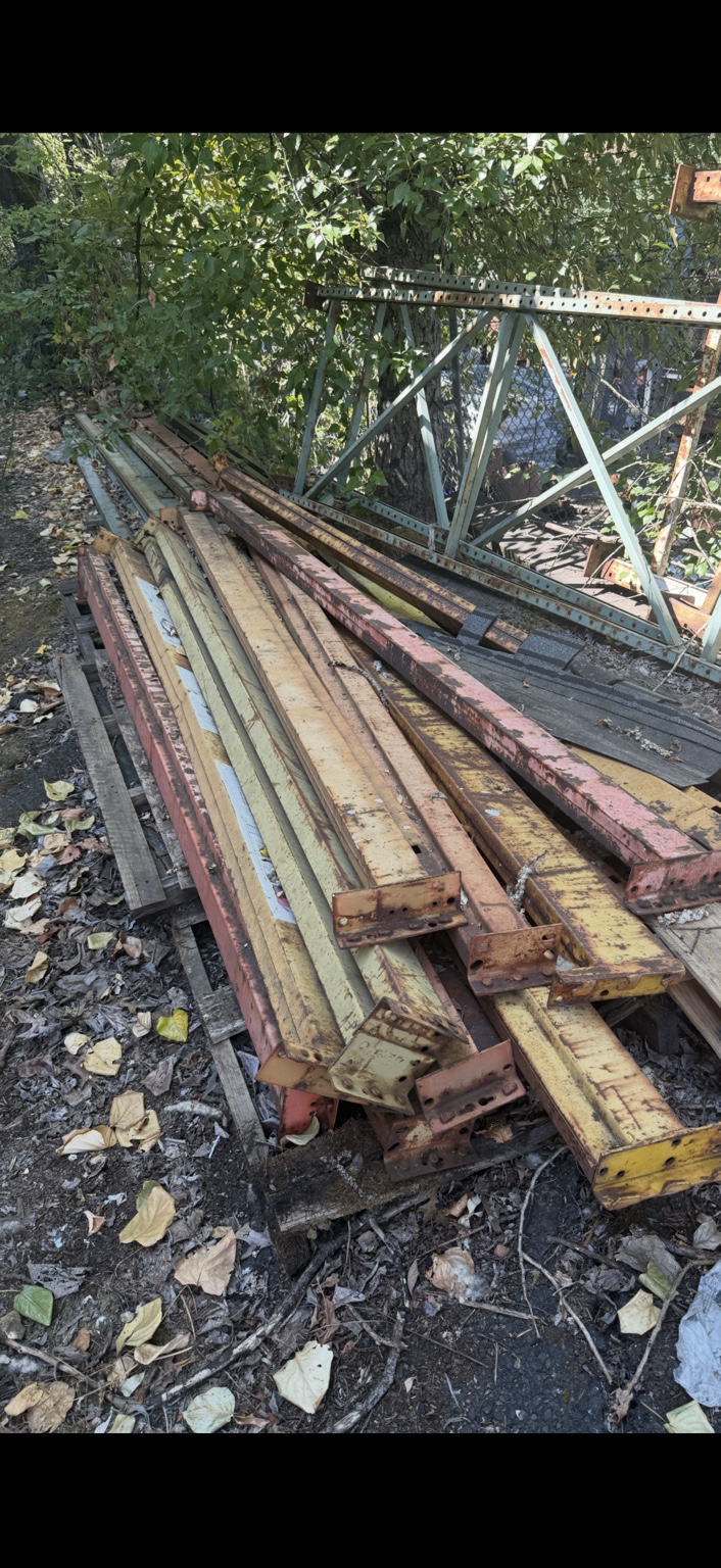 Salvaged rack beams stacked together